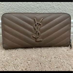 Signs of wear YSL rare taupe colored wallet!
